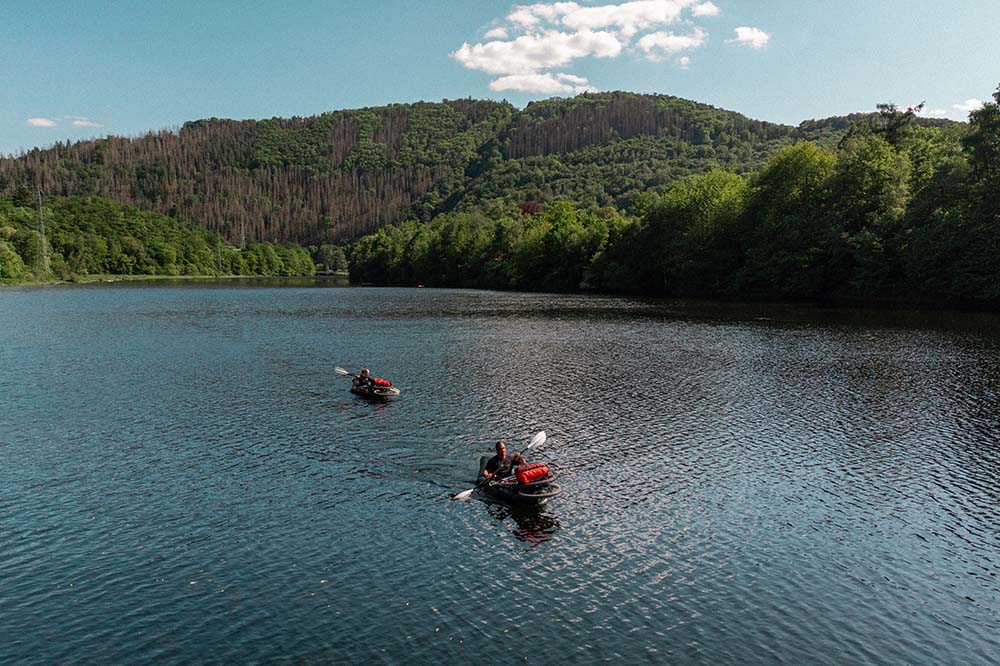 10 Good Reasons Why You Should Start Packrafting 1 Two friends bikeraften on the Rure in Germany.