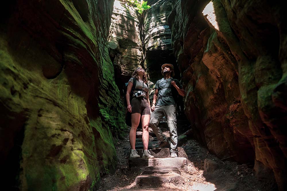 The Müllerthal Trail: discover the most beautiful places of Little Switzerland Luxembourg 1 Müllerthal ~ 2 best friends walking the Müllerthal trail. | Packraft Travel